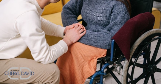 man talking to a another person in wheelchair