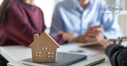 couple talking to a lawyer about estate